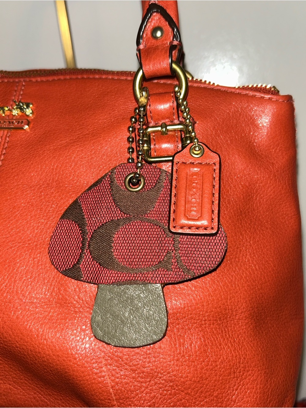 Coach Madison model, the Sophia Satchel. Upcycled Mushroom Charm and Dust Bag - Picture 2 of 10
